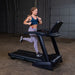 T25 Folding Treadmill Side View athlete running woman