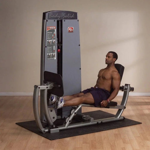 Athlete performing a calf raise on the Body-Solid Pro Dual Leg Press/Calf Extension DCLP-SF