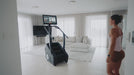 Video demonstration of various athletes using the STEPR+ Stair Climber in different settings, showcasing promotional and functional features, including accessibility, touchscreen use, and workout versatility.