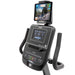 Close-up view of the Spirit Fitness XBR95 Recumbent Bike console with a tablet attached to the swivel-tilt tablet holder, showing workout data on the 7.5” multi-color ClearView™ display."