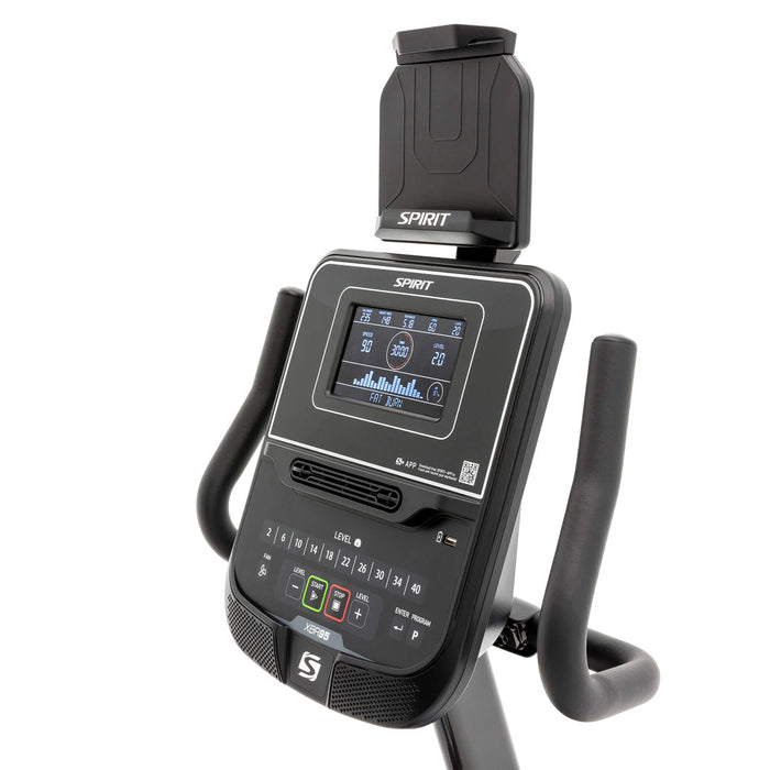Close-up view of the Spirit Fitness XBR95 Recumbent Bike's console with a 7.5” multi-color ClearView™ display and the swivel-tilt tablet holder positioned above it.