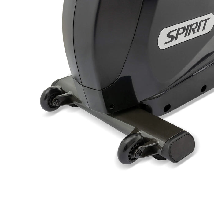 Close-up front view of the Spirit Fitness XBR95 Recumbent Bike, highlighting the transport wheels and sturdy base for easy mobility and stability.