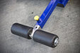 Close-up of the Legend Fitness Ab Crunch Machine 941 with a blue frame, black upholstery, and detailed view of the shin pad.