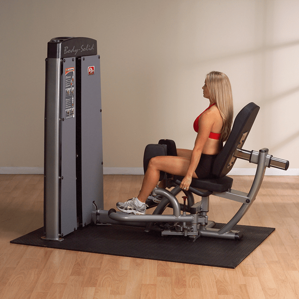 Personal trainer using the Body-Solid Pro Dual Inner/Outer Thigh Machine DIOT-SF