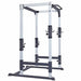 Side view of the York Barbell FTS Power Cage 48053 showcasing its sturdy frame, compact design, adjustable bar positions, and integrated chin-up bar, ideal for strength training in small spaces.