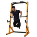 Athlete performing dips using the dip attachment on the Workbench Half Rack WB-HR-Y with yellow frame